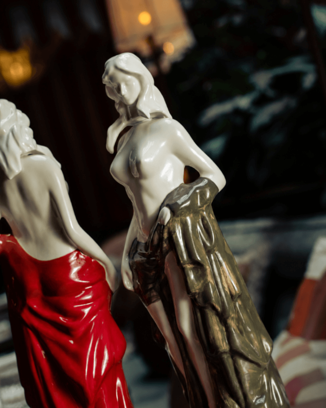 Dyane Paris sculptures with red and green drapery