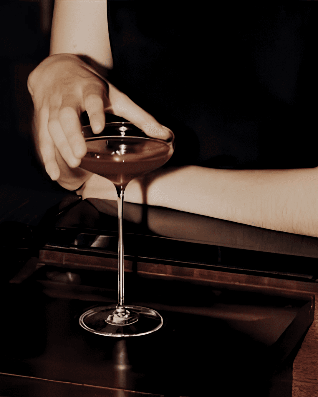 Dyane Paris signature cocktail presented in a coupe