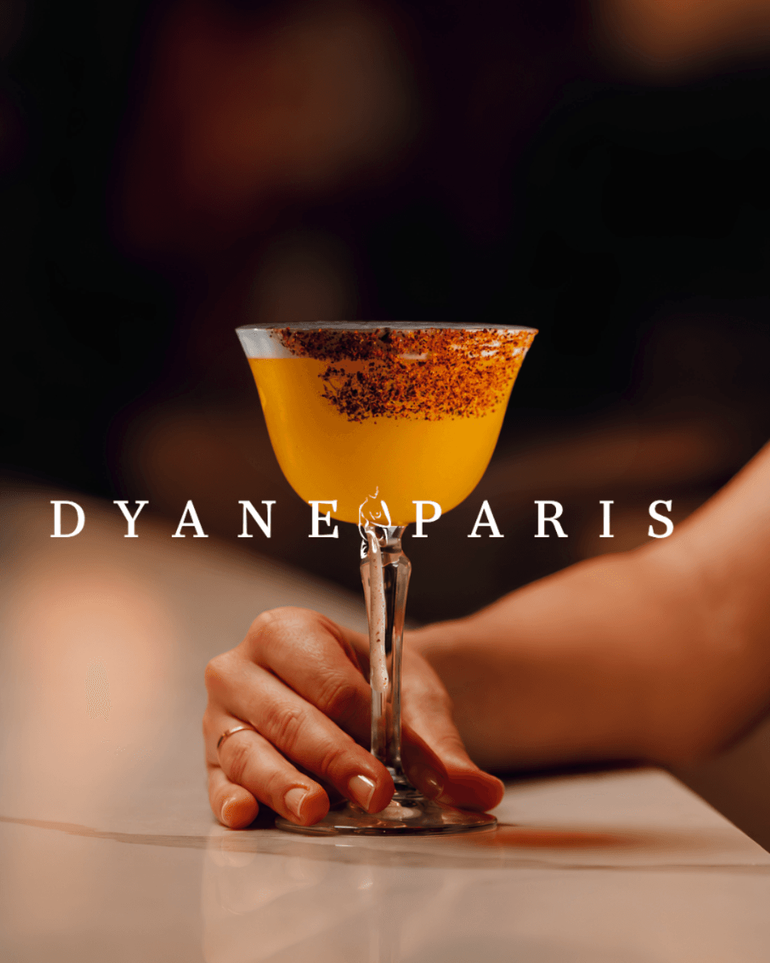 Yellow cocktail in the Dyane Paris art of hosting universe